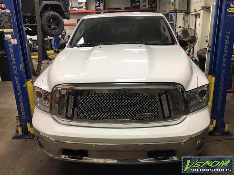 RAM with Royalty Core grille and Vision X lights