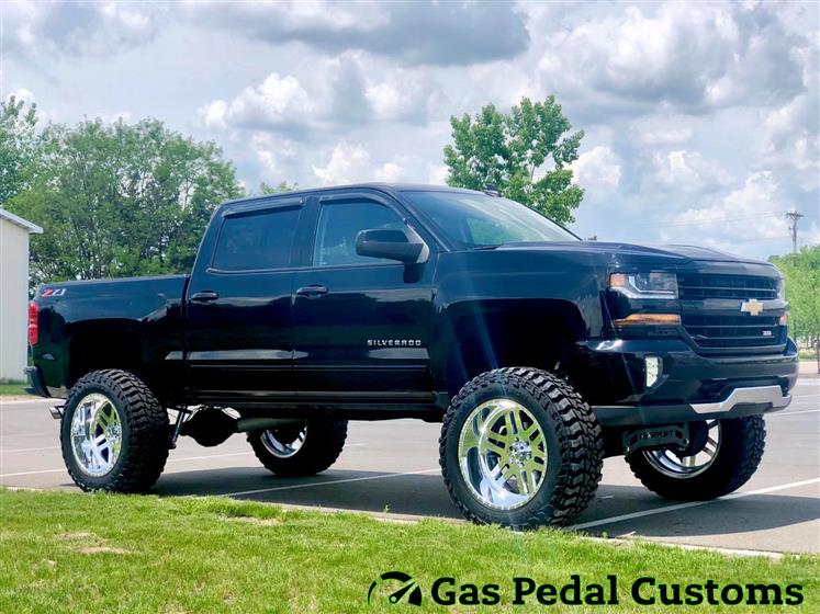 Lifted Chevy Silverado with American Force Wheels