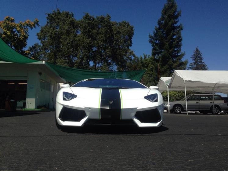 White Lamborghini Aventador with Racing Stripes